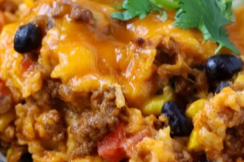 Delicious beef enchilada casserole with rice served in a baking dish