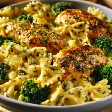 Cowboy Butter Lemon Bowtie Chicken served with broccoli for a delicious meal.
