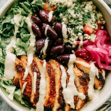 Cozy chicken shawarma meal prep bowls with colorful vegetables and spices