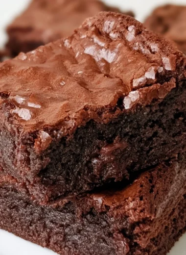 Cozy classic brownie recipe showcasing rich, fudgy brownies on a plate.