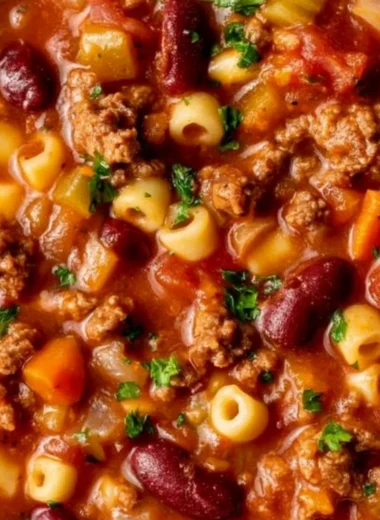 Bowl of cozy pasta and beans recipe, perfect for a comforting meal.