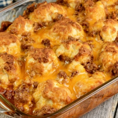 Cozy Sloppy Joe Biscuit Casserole topped with flaky biscuits