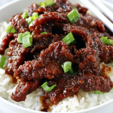 Gluten Free 30-Minute Mongolian Beef served on a plate with vegetables