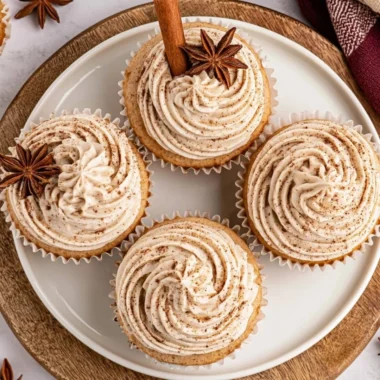 Spiced chai latte cupcakes decorated with creamy frosting and cinnamon