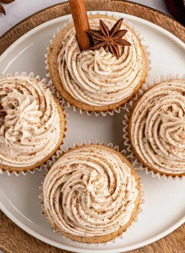 Spiced chai latte cupcakes decorated with creamy frosting and cinnamon